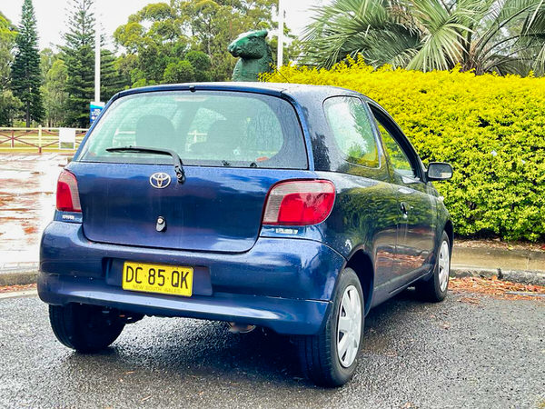 Used Toyoya Echo for sale Automatic model - rear drivers side low angle view 