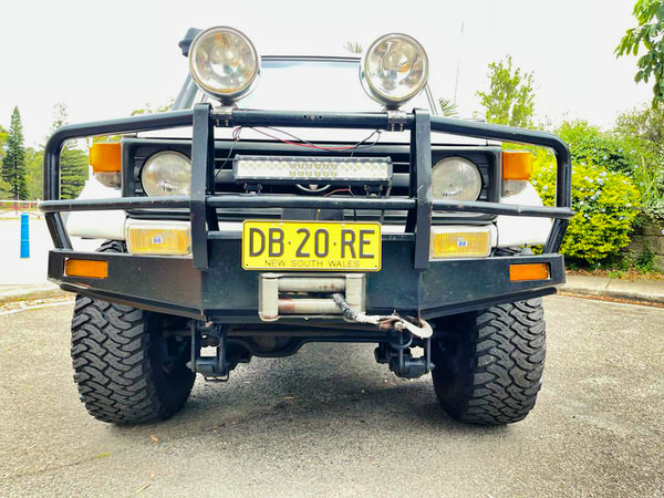 Toyota Landcruiser UTE for sale - view from front with roo bars winch and driving lights