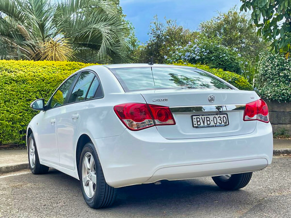 Used Holden Cruze for sale - Automatic - photo showing from passenger rear side angle view