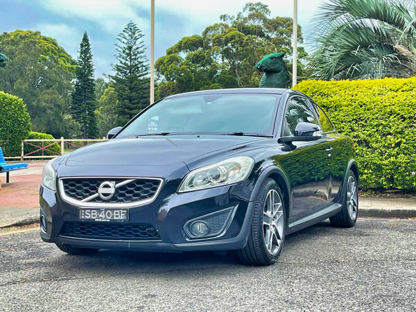 Photo of a Volvo C30 car from the front passenger low side angle view 