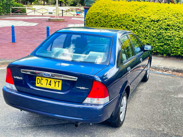 Used Ford Laser for sale - Automatic model - photo showing the view from the rear side angle view 