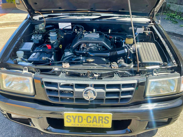 Used Holden 4x4 for sale - photo of the bonnet opened showing the clean V6 Petrol engine
