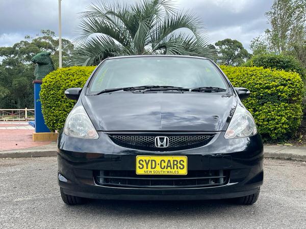 used Honda Jazz for sale - photo of the view from the front of the vehicle showing the headlines and grille