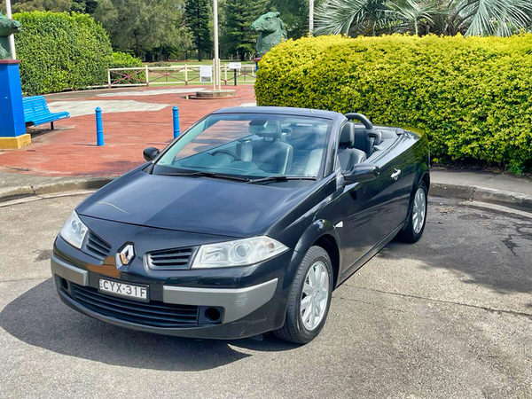 Photo showing front passenger side angle view of this used Renault Megane convertible for sale 