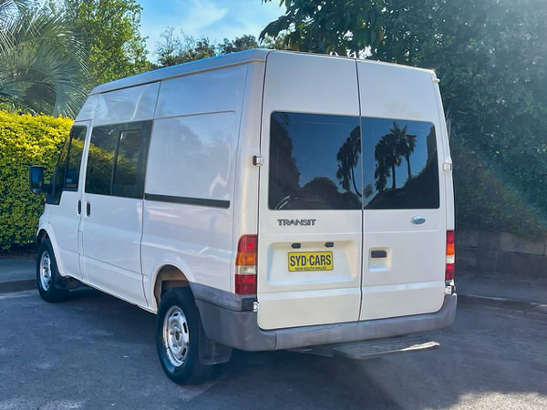 Used Ford Transit for sale - photo showing the rear passenger side angle view with sliding side door