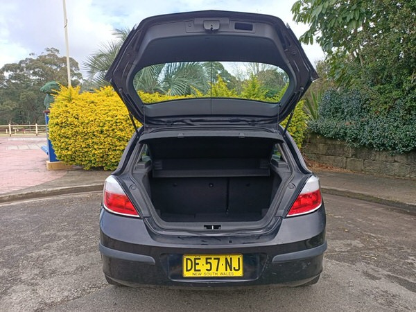 Photo showing the size of the boot with the tailgate open on this used Astra for sale