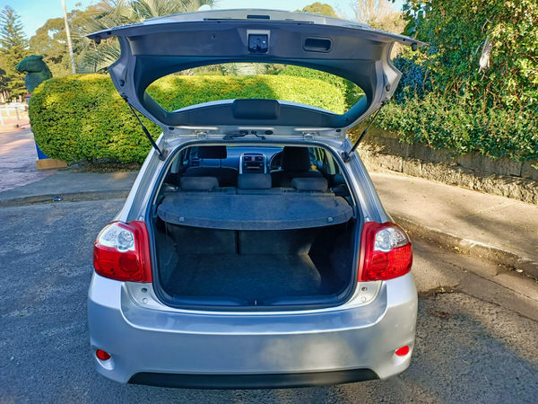 Toyota Corolla 2010 model for sale - photo showing the rear tailgate open and the size of the boot