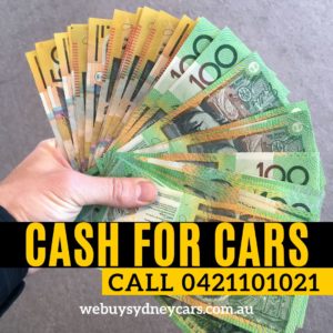 We buy all kinds of old cars for cash in Sydney - Photo showing a man holding a lot of Australian dollars after selling his car to Sydneycars