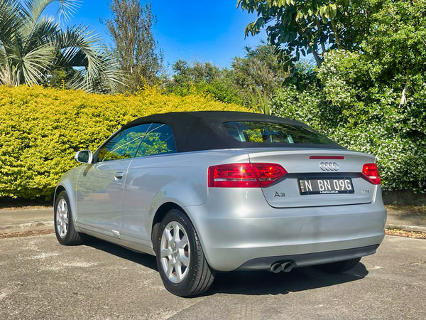 Used Audi A3 for sale - Automatic Convertible Model - picture showing the rear passenger side angle view with roof up