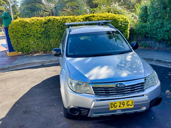 Subaru Forester for sale - metallic silver 2009 model - front passengers side angle view