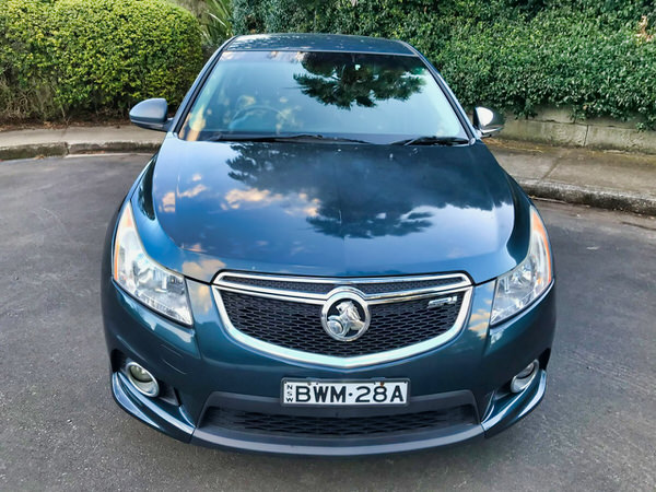 Used Holden Cruze for sale - Green coloured 2011 Full leather Model - photo showing from the front straight on view showing the colour coded from bumpers and grille