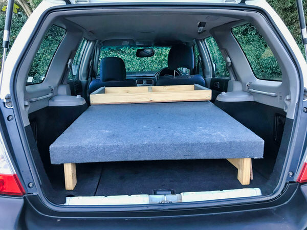 4x4 camper for sale - Photo showing a Subaru Forester 2 person campervan with space under the double bed for storage