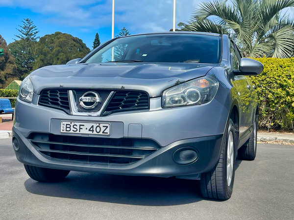Used Nissan SUV for sale - Automatic 2010 Dualis model - photo showing the front of the vehicle with colour coded bumpers and integrated grille