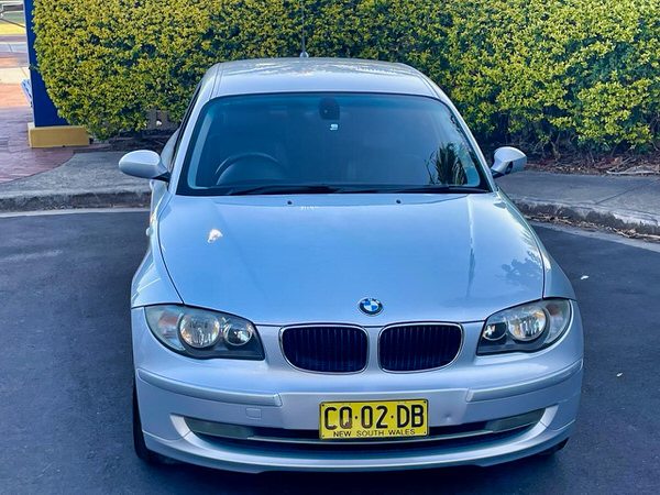Used BMW for sale - Series 120i in fantastic condition - photo showing the front straight on view with colour matching front bumper and grille