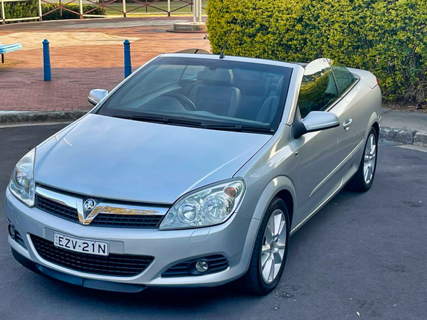 Convertible for sale in Sydney - Automatic hard top 2007 model - photo showing the front passengers side angle view with roof down from the front of the vehicle