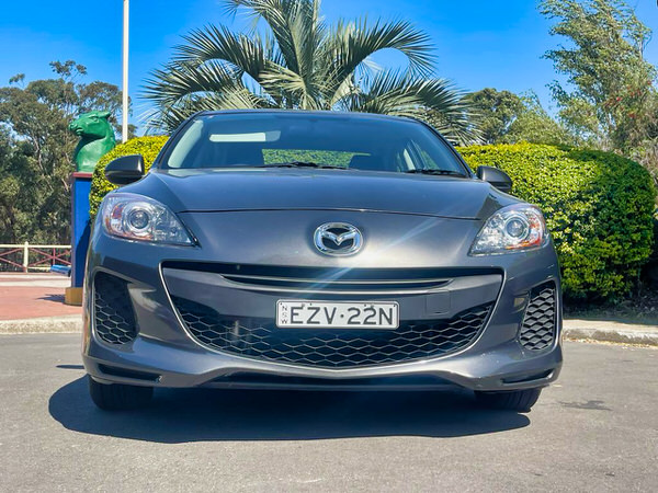 Mazda for sale - Automatic 2013 Mazda 3 model Rego EZY22N - Photo showing the front straight on view with colour coded bumpers and front grille