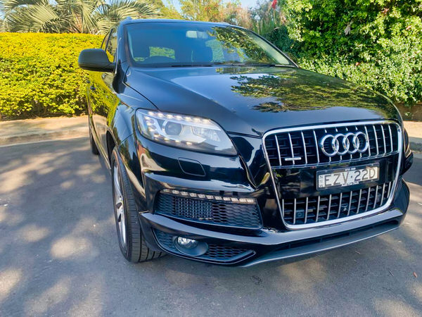 Used Audi for Sale - Model shown is 2012 Automatic Q7 seven seater in Black - photo shows the front drivers side angle view