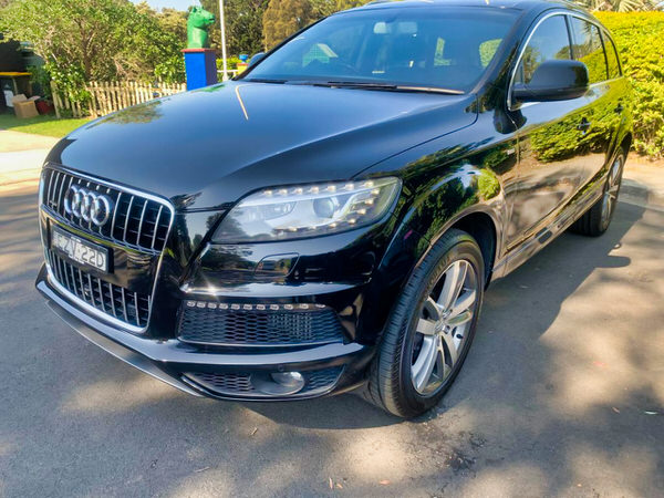Used Audi for Sale - Model shown is 2012 Automatic Q7 seven seater in Black - photo shows the front passengers side angle view from a low angle