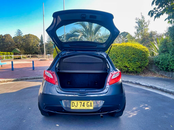 Used Small Mazda for Sale - 2011 Automatic low kms + service books Model - photo showing the rear tailgate open with parcel shelf and showing how much boot space is in the vehicle