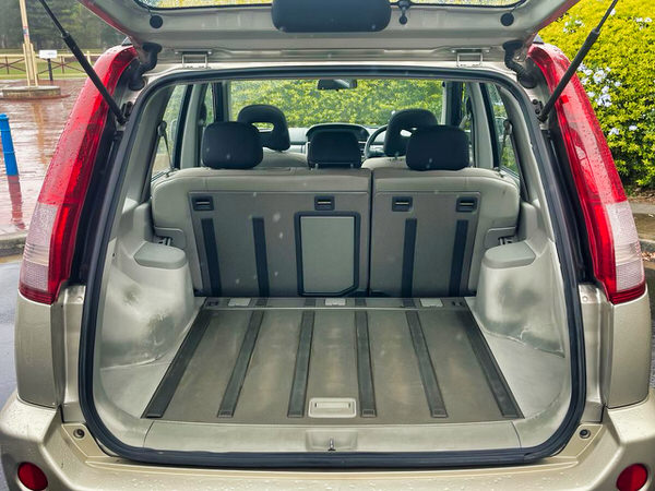 Small SUV for sale - Nissan X-Trail Automatic 2006 Model - Photo showing the rear cargo area with plenty of space for shopping and the practical rear fold back seats