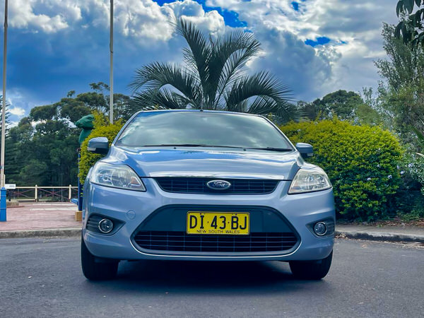 Used Ford Focus for sale in Sydney - Automatic 2009 model with low kms - Photo showing the front straight on view with colour matching front bumper and grille