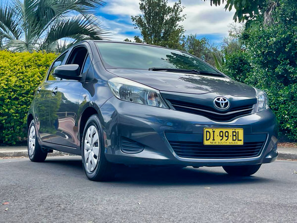 Used Toyota Yaris for sale - Automatic 2012 model with low Kms - Photo showing the front drivers side and photo taken from a low angle