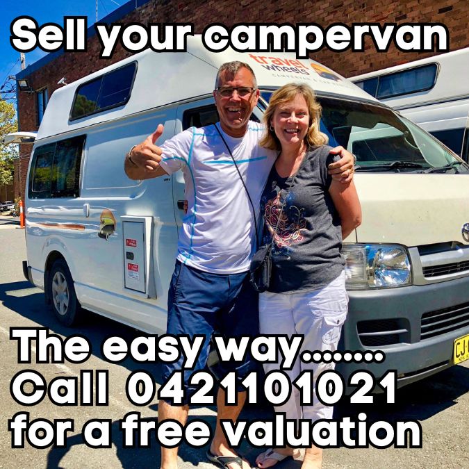 Sell your campervan the easy way - couple in front of a Toyota Hiace