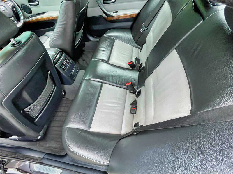 BMW 3 Series for sale - automatic 2008 E90 model in Metallic Grey - Photo showing the view sitting in the rear of the vehicle with dual coloured full leather interior in great condition