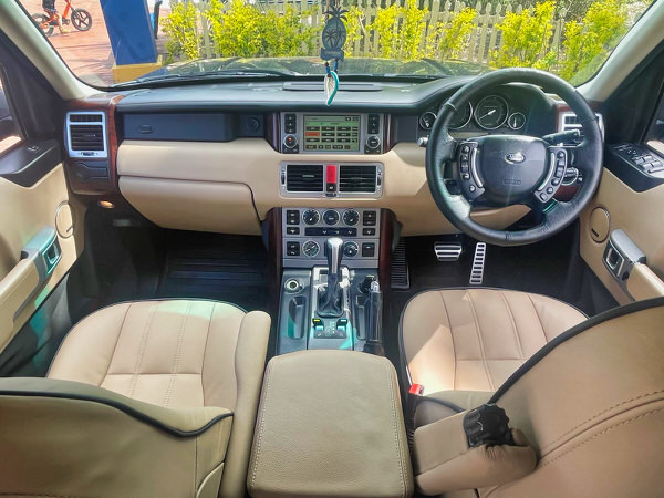 Used Land Rover for sale V8 Vogue Supercharger Automatic 2006 Model in Black - Photo showing the view in the front driver seat looking out of the window