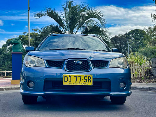 Subaru Impreza for sale - AWD Manual 2007 Model in Metallic Blue - Photo showing the matching colour coded front bumper and black grille