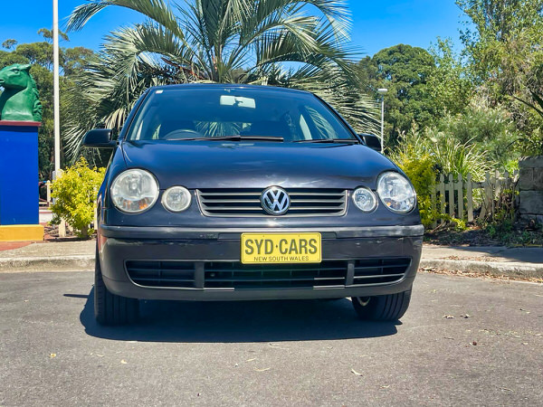Used Polo for sale in Sydney - 2004 Automatic model in black - photo showing the front straight on view with colour matching front bumper and grille