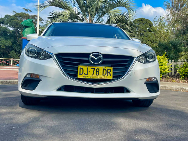 Mazda for sale - Automatic 2016 Mazda 3 model Rego DJ78DR - Photo showing the front straight on view with colour coded bumpers and front grille
