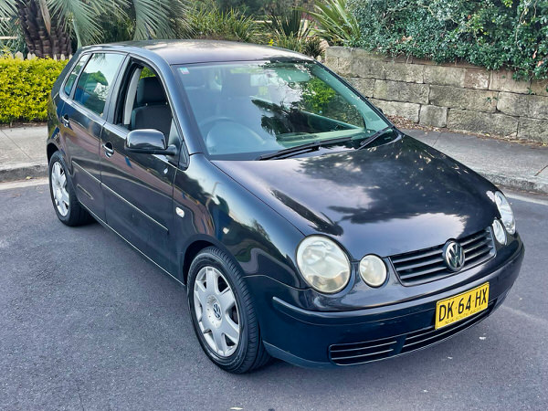 Used Polo for sale in Sydney - 2004 Automatic model in black with Rego - photo showing the front drivers low side angle view