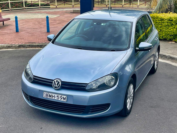 Used Golf for sale - 2009 Automatic 1K MY10 90 TSI Trendline model in Metallic Blue - photo shows the front passenger side angle view showing the length of the car