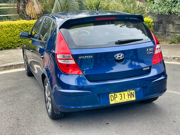 Used Hyundai i30 for sale in Sydney - Model shown is the Hyundai i30 Trophy Automatic 2012 model. Photo showing the low angle from the passenger side rear side of the vehicle