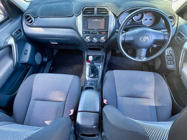 used Toyota Rav4 for sale in Sydney - Model shown in the photo is a Toyota RAV4 Cruiser 2005 model in Silver with Roof Rack and Roo bars - Photo showing the view sitting in the driver seat looking out of the windscreen