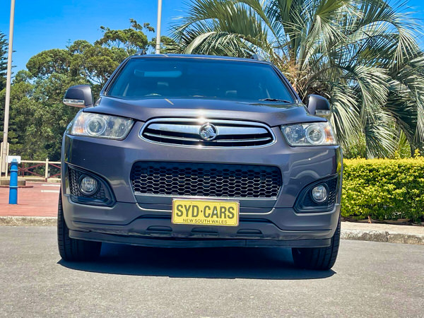 Used 7 seater SUV Holden Captiva for sale - Automatic 2015 model in Charcoal - photo showing the front straight on view with colour matching front bumper and grille