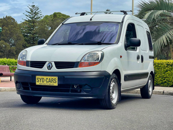 Used Van for Sale in Sydney - Automatic 2005 White small van with side sliding door and underfloor pull out storage - great Tradie van or campervan conversion model - photo showing the front driver side angle view