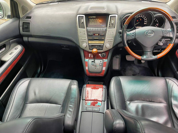 Used Lexus for sale - Automatic Full Leather SUV RX350 model in Gold - great online reviews - photo showing the view sitting in the front driver seat looking out of the windscreen