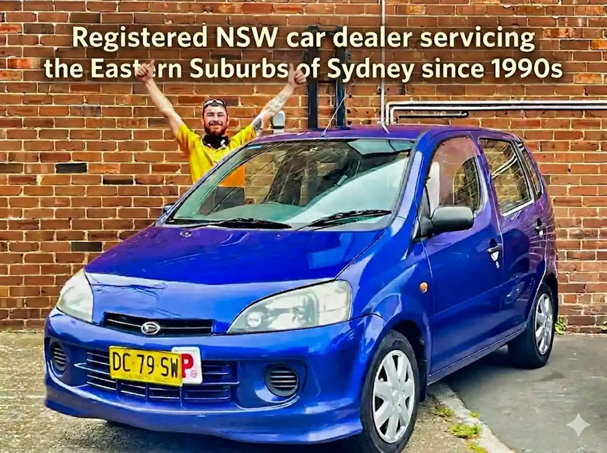 Smiling customer with a blue Daihatsu at Sydneycars, Botany, the best used car dealer Sydney.