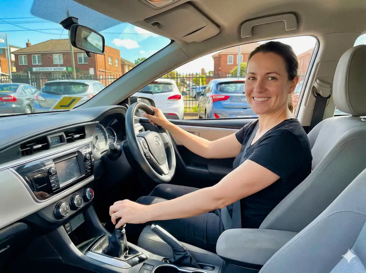 Test driving a used manual car under $10,000 at Sydneycars Botany - great for learner drivers and saving money on fuel