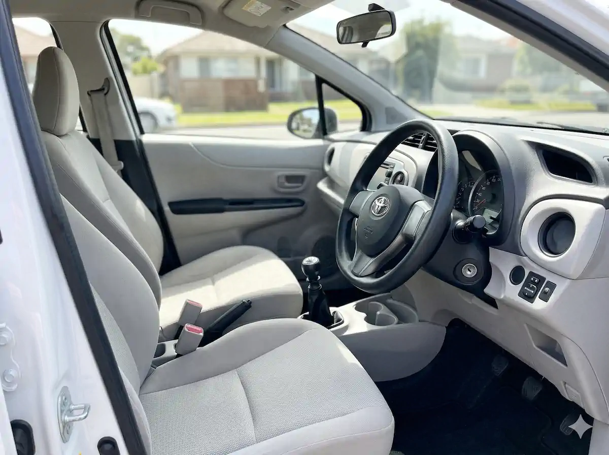 Thinking to buy your first car, manual are better value for money. Photo of used manual car interior. 