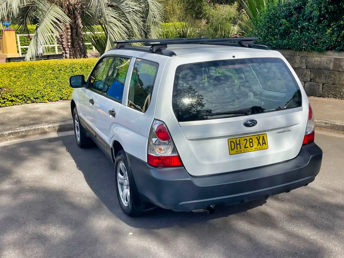 Used white 2006 Subaru Forester rear view of the car