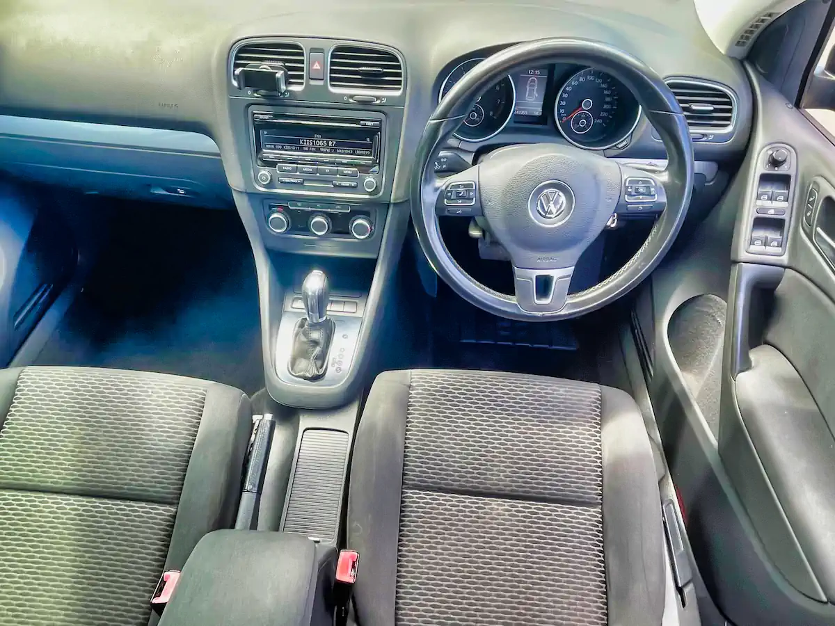 Interior drivers cabin view of black used Golf TSI at Sydneycars