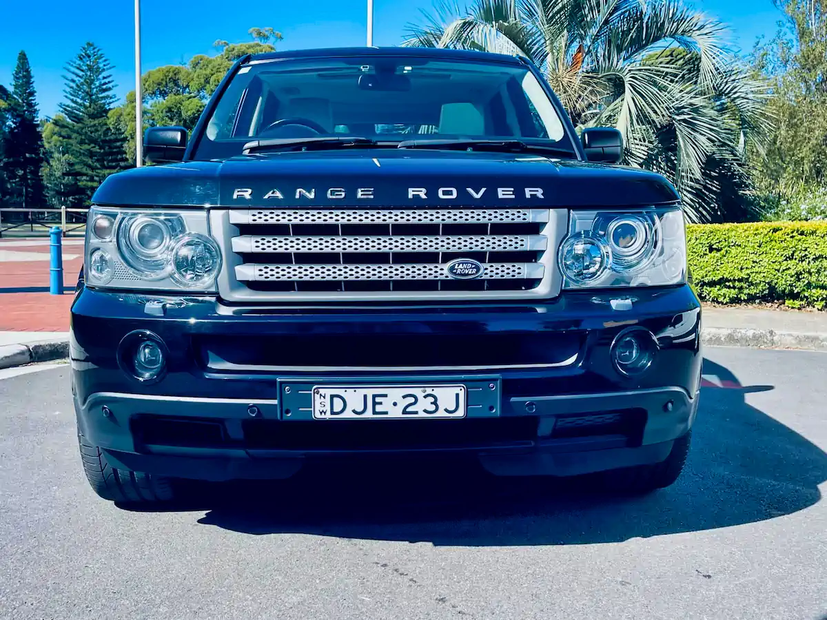 Front straight-on view of Black Range Rover Sport V8 Supercharger with impressive grille and matching black bumper