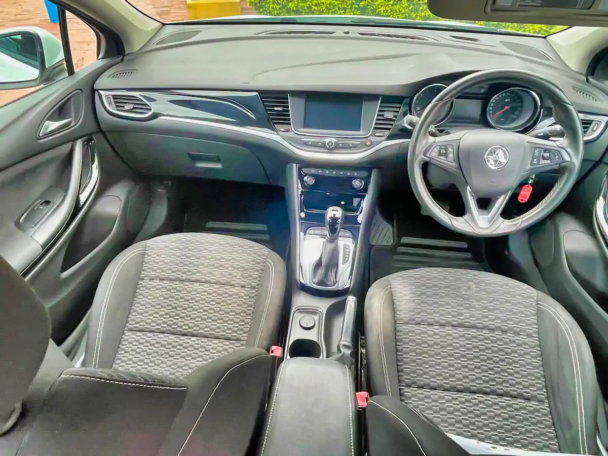 nterior view of this used Astra showing the clean cabin, automatic transmission, and well-maintained features.